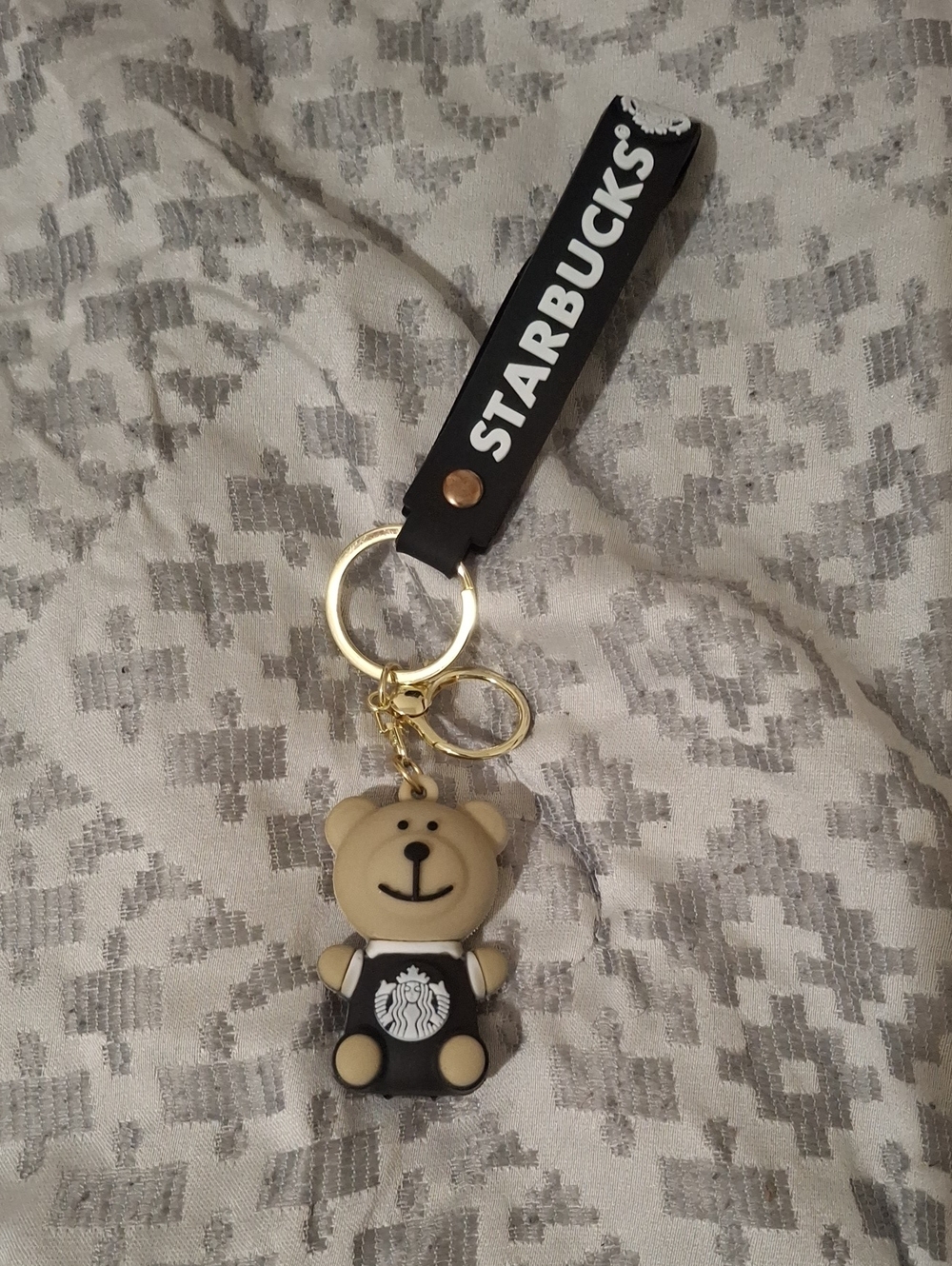 Beige Bear Keychain with Black Logo Strap and Gold Hardware